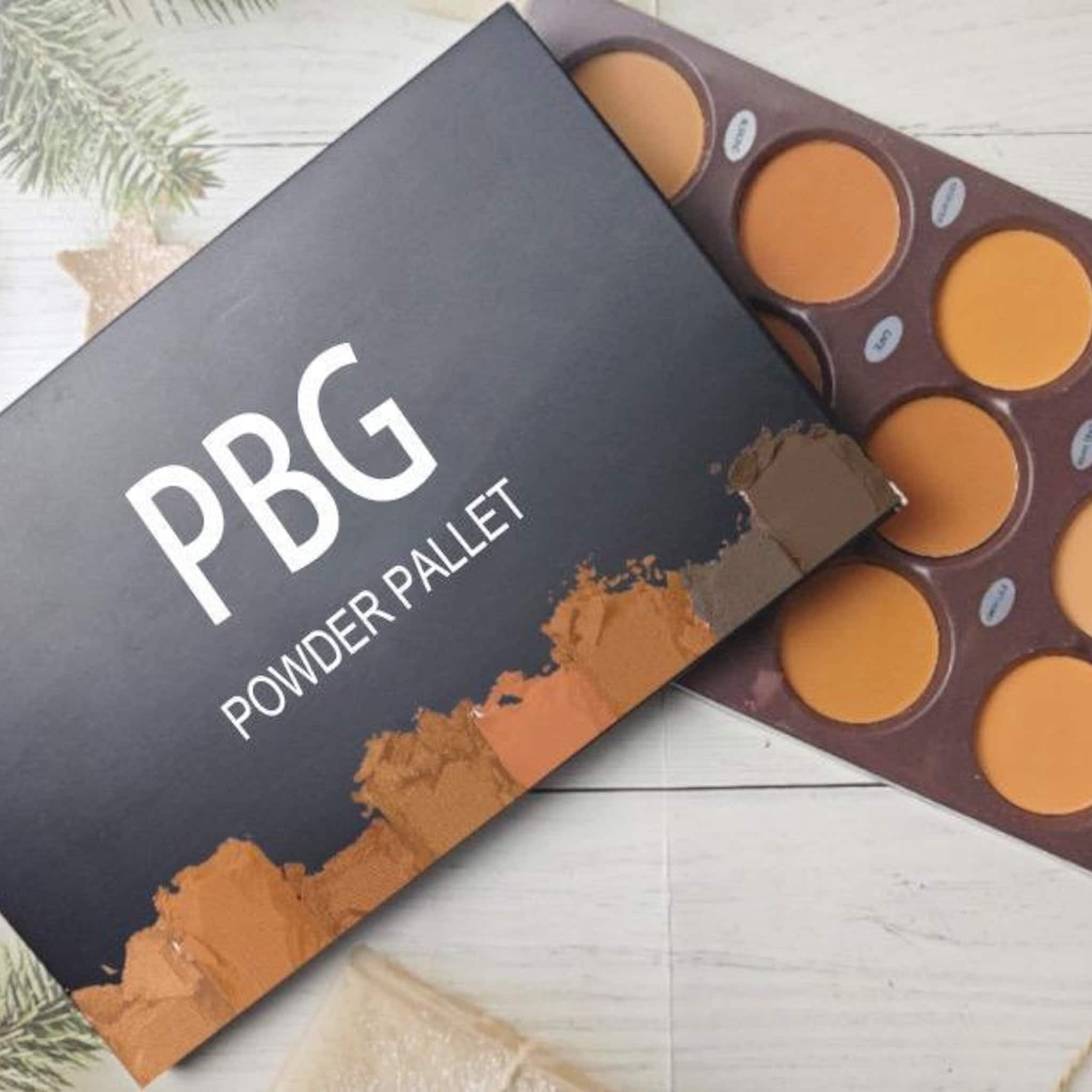 Powder pallet with PBG branding, black and brown, with round powder pans