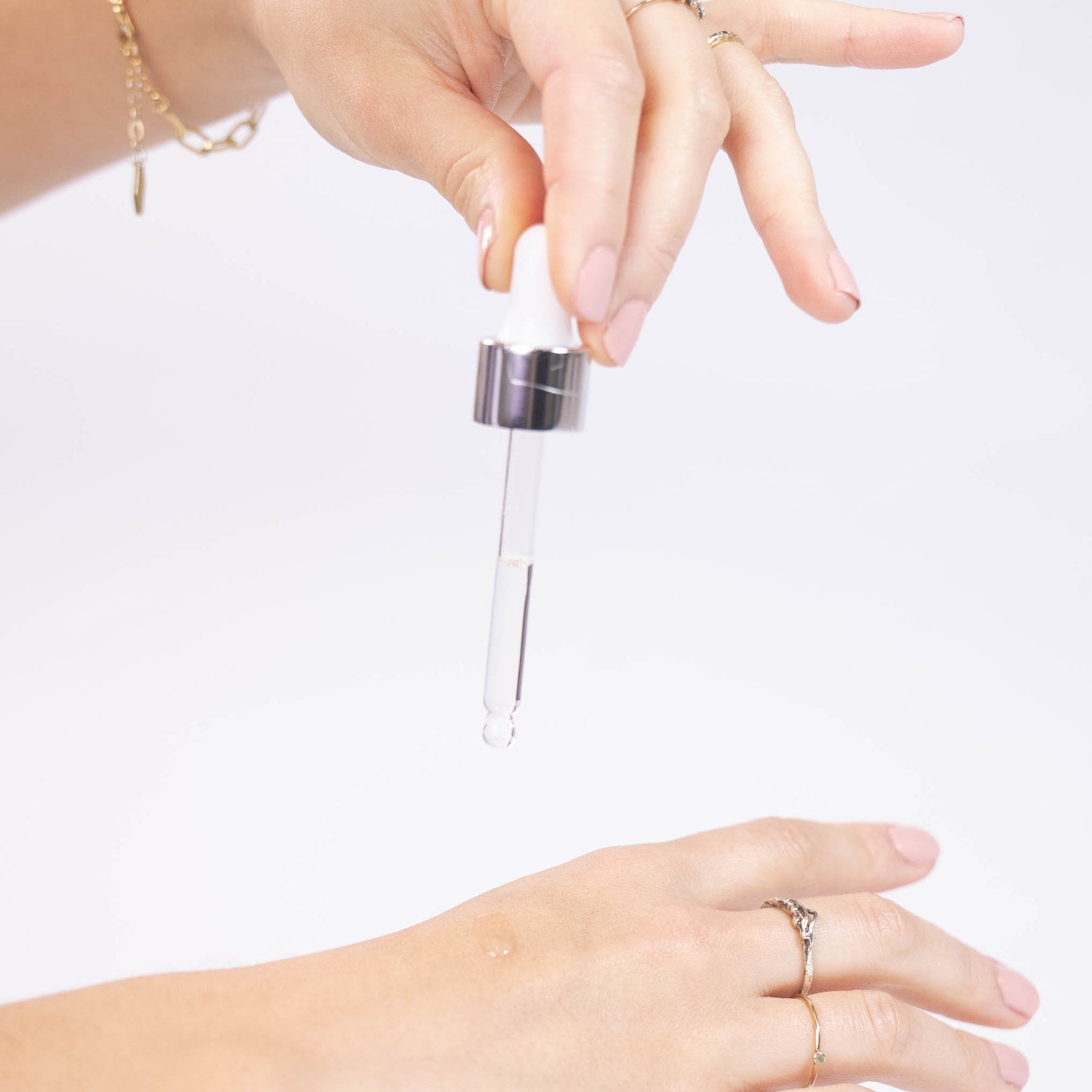 Detailed close-up of Weightless Dry Oil for All-Day Glow  Skin Tone Improvement with Botanicals  Squa