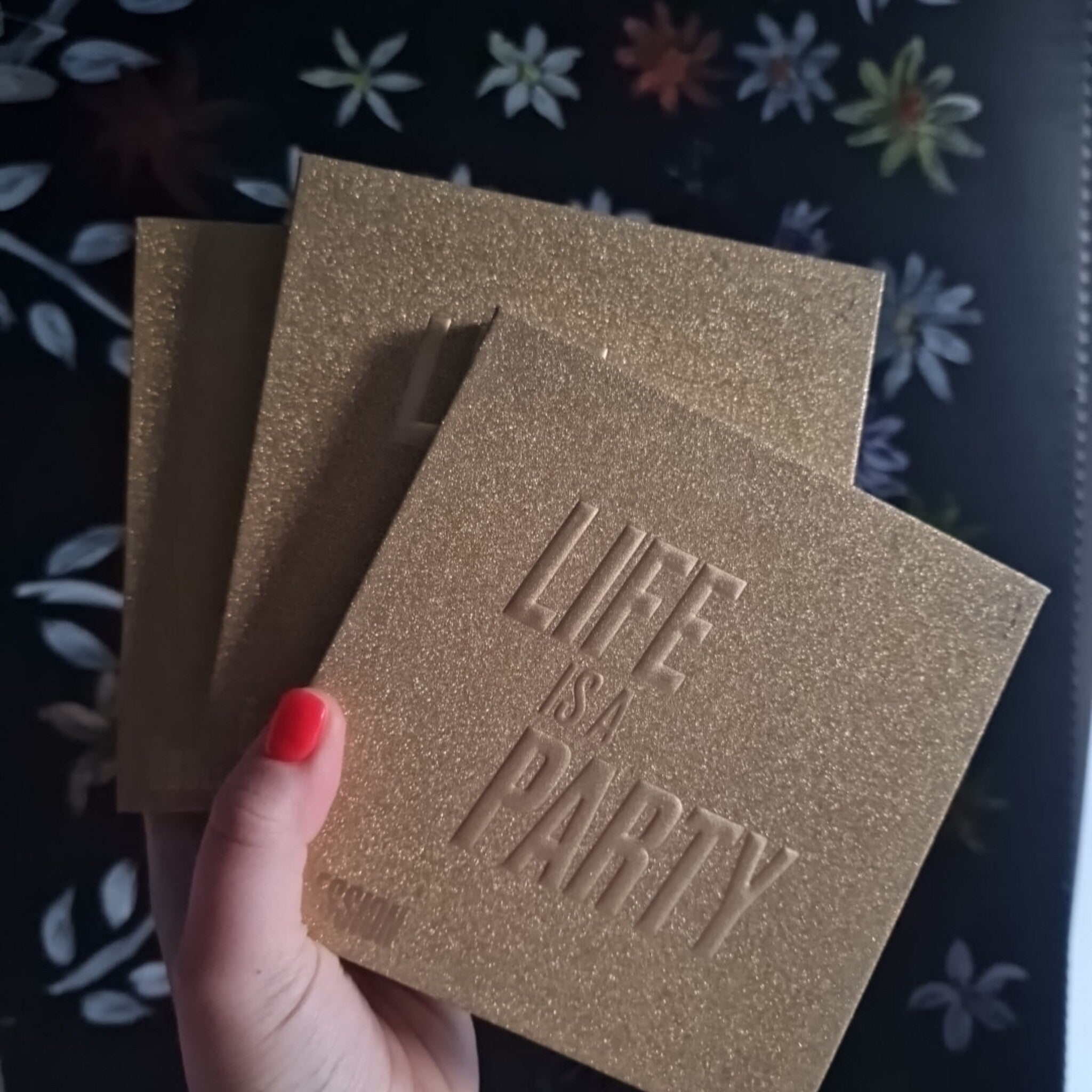 Life is a Party eyeshadow palette featuring warm mocha shades in a festive gift-ready packaging with gold accents