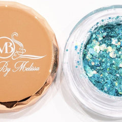 Side angle view of turquoise glitter eyeshadow pot showing shimmer particles catching light