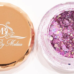 Side view of pink and purple glitter eyeshadow palette showing shimmer texture and compact size