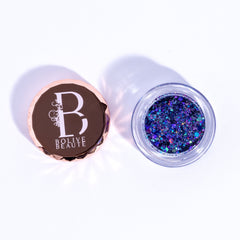 Dual-tone indigo and deep purple glitter eyeshadow palette with shimmer finish in compact case