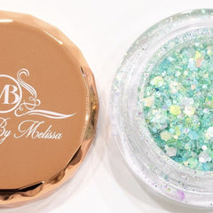 Side view of mint green glitter eyeshadow pot showing shimmer texture and mojito shade depth