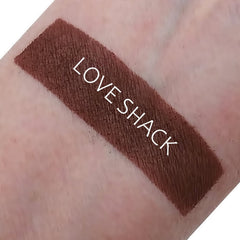 Square matte eyeshadow compact in deep burgundy shade with Love Shack label