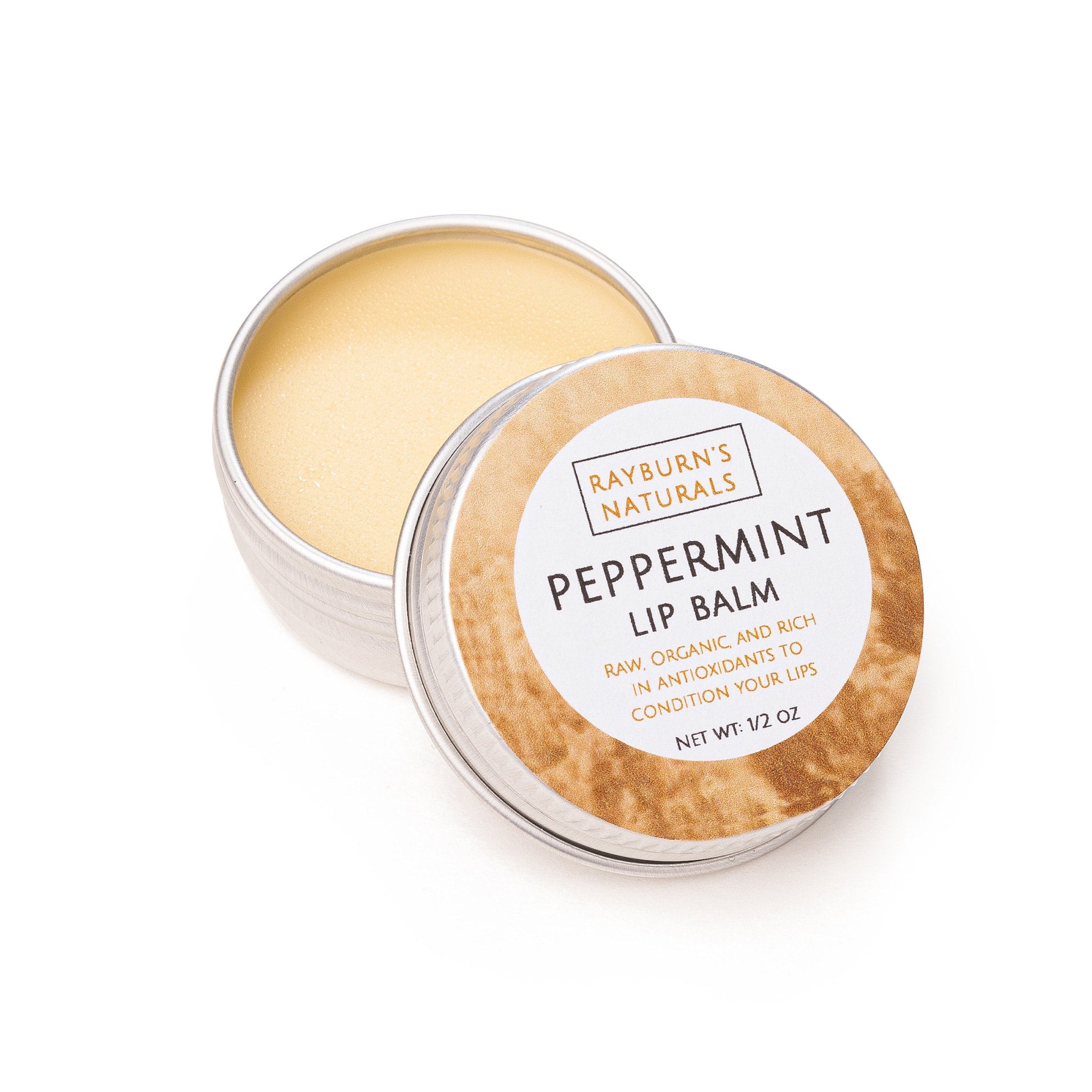 Lip balm in silver tin, with light brown and white label, Rayburn's Naturals branding visible