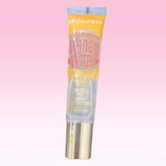 Lip gloss tube with yellow and clear packaging, Broadway Vita Soft brand name visible, gold base