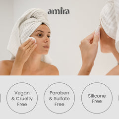 Hand applying vegan collagen toner with fingertips onto hydrated cheek, showcasing lightweight liquid texture