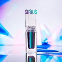 Hand applying multichrome liquid eyeshadow with doe-foot applicator, showing iridescent shift on eyelid