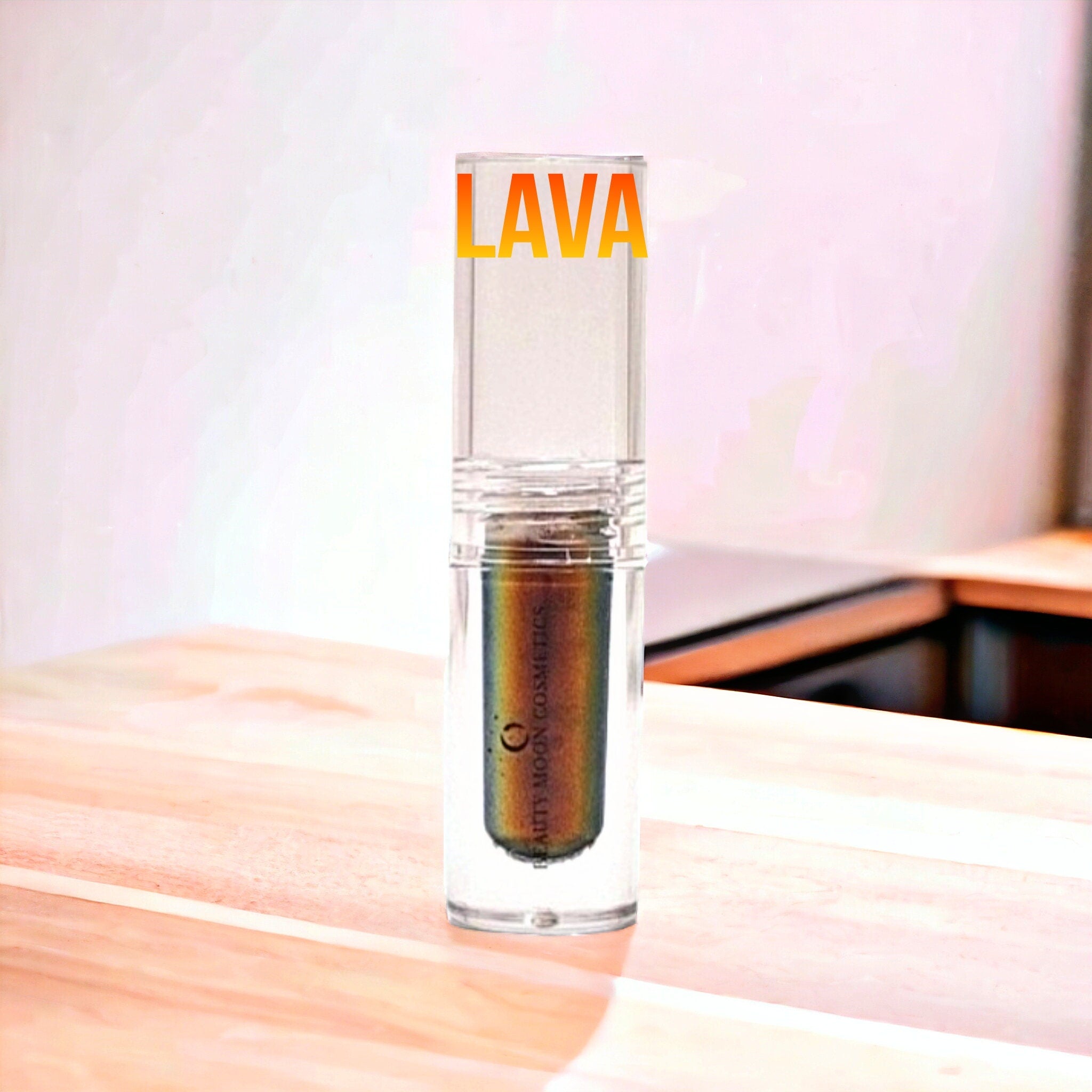 Close-up of multichrome liquid eyeshadow swatch showing shifting iridescent hues on skin