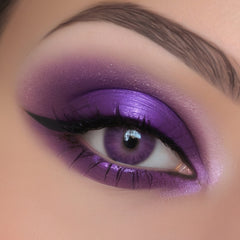 Vegan mineral eyeshadow pot in deep purple with smokey grey-blue undertones and matte finish