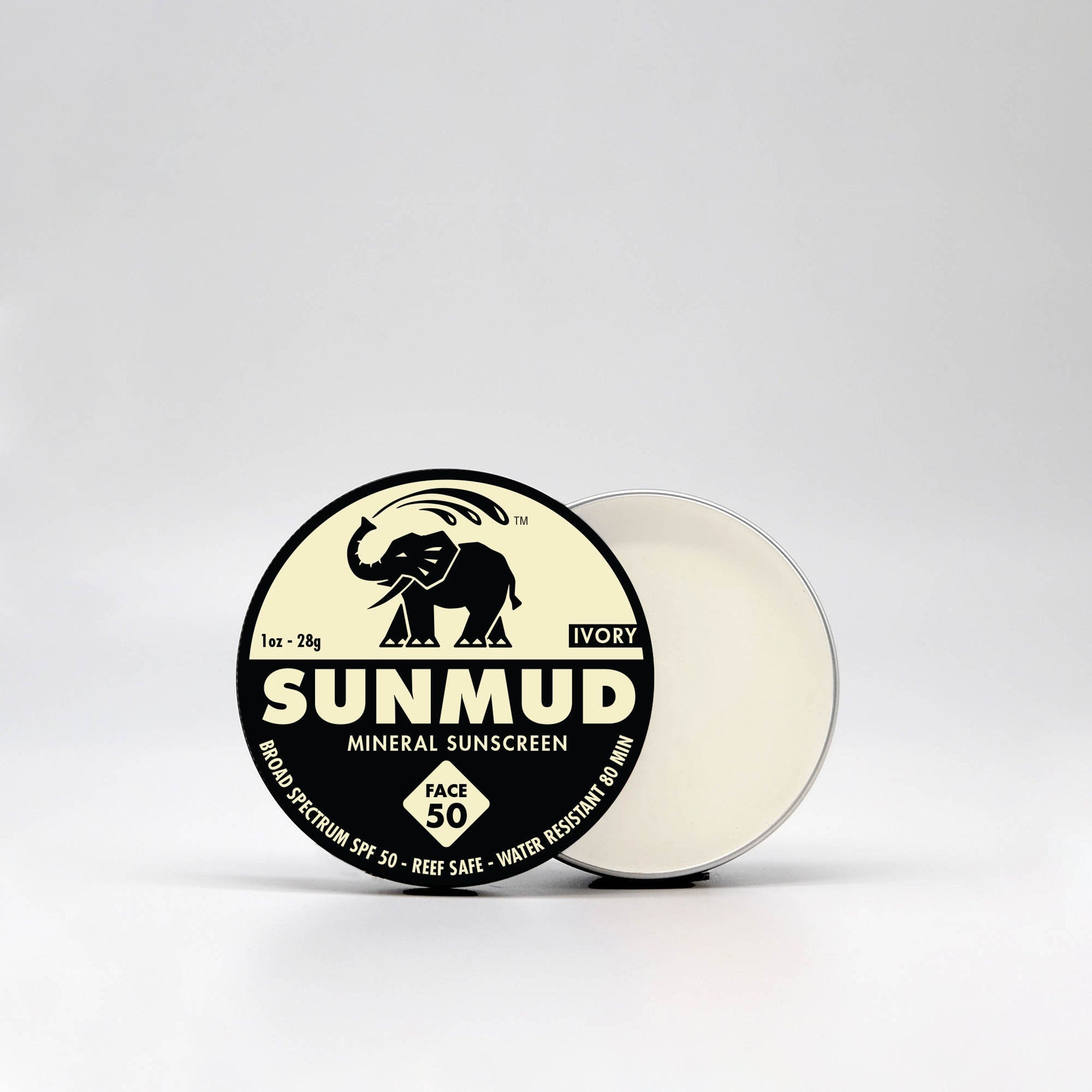 SUNMUD mineral sunscreen jar, ivory cream, black and white label, open lid showing cream