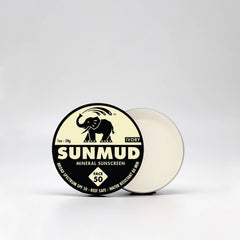 SUNMUD mineral sunscreen jar, ivory cream, black and white label, open lid showing cream