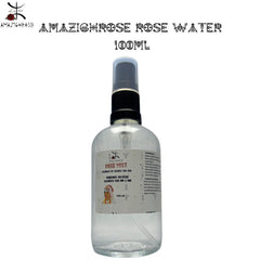 Rose water spray bottle, clear glass, black cap, with Amazighrose label and text
