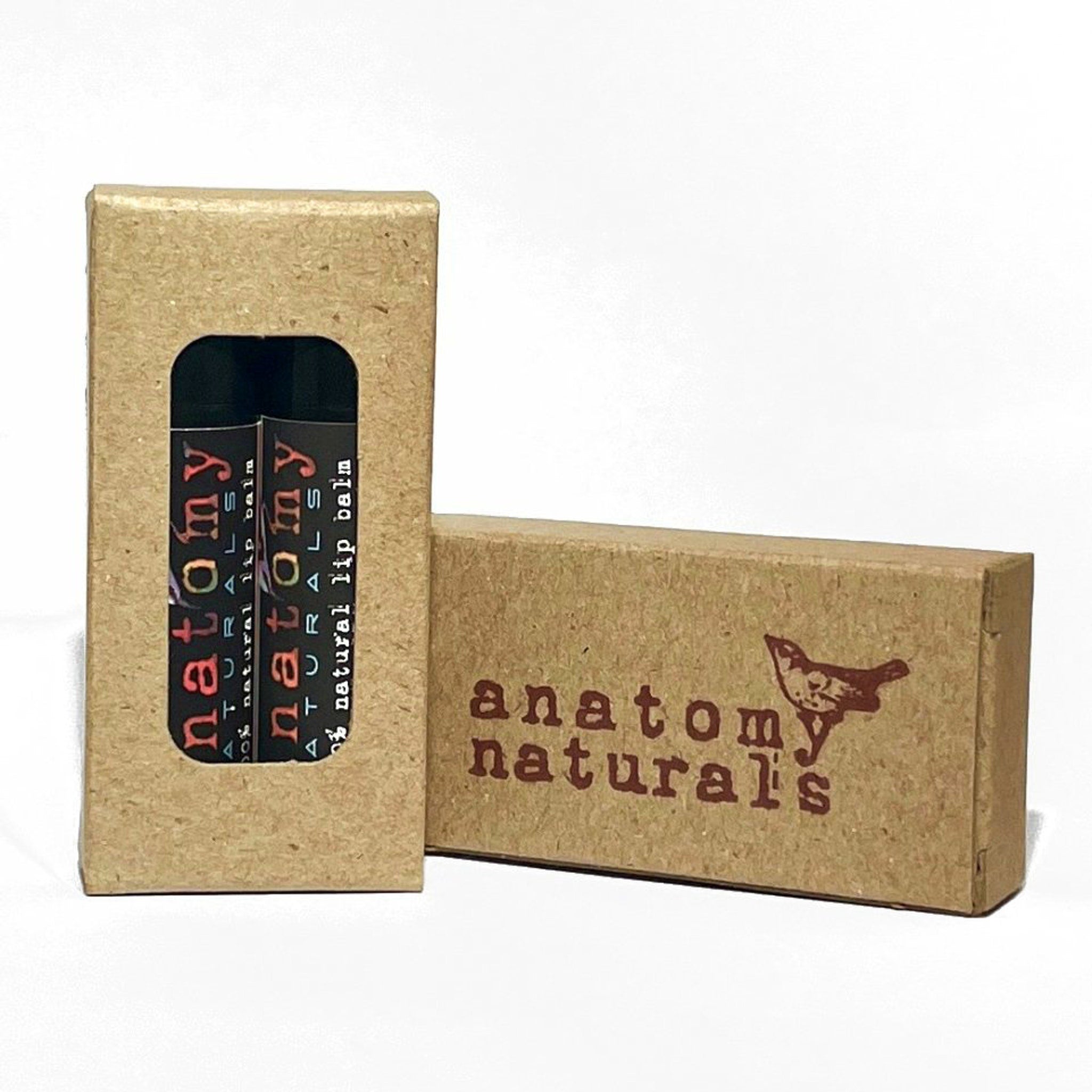 Lip balm in cardboard packaging with brand name and logo, natural lip balm tubes visible