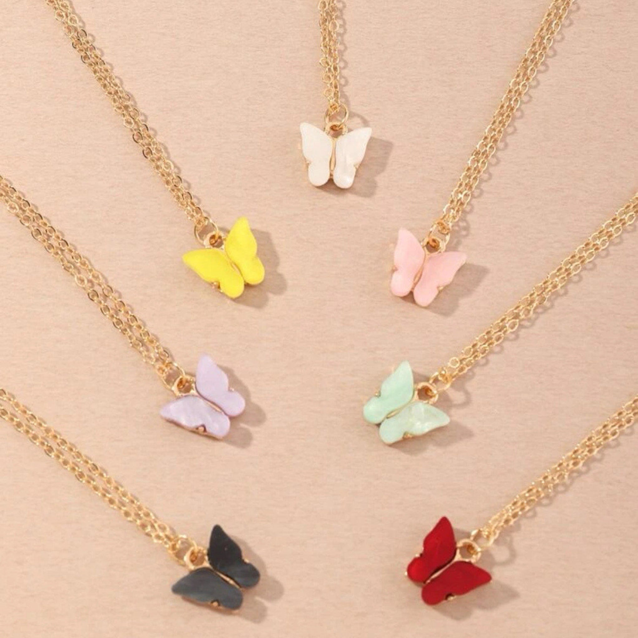 Butterfly pendant necklaces with gold chain and colorful butterfly pendants in various colors
