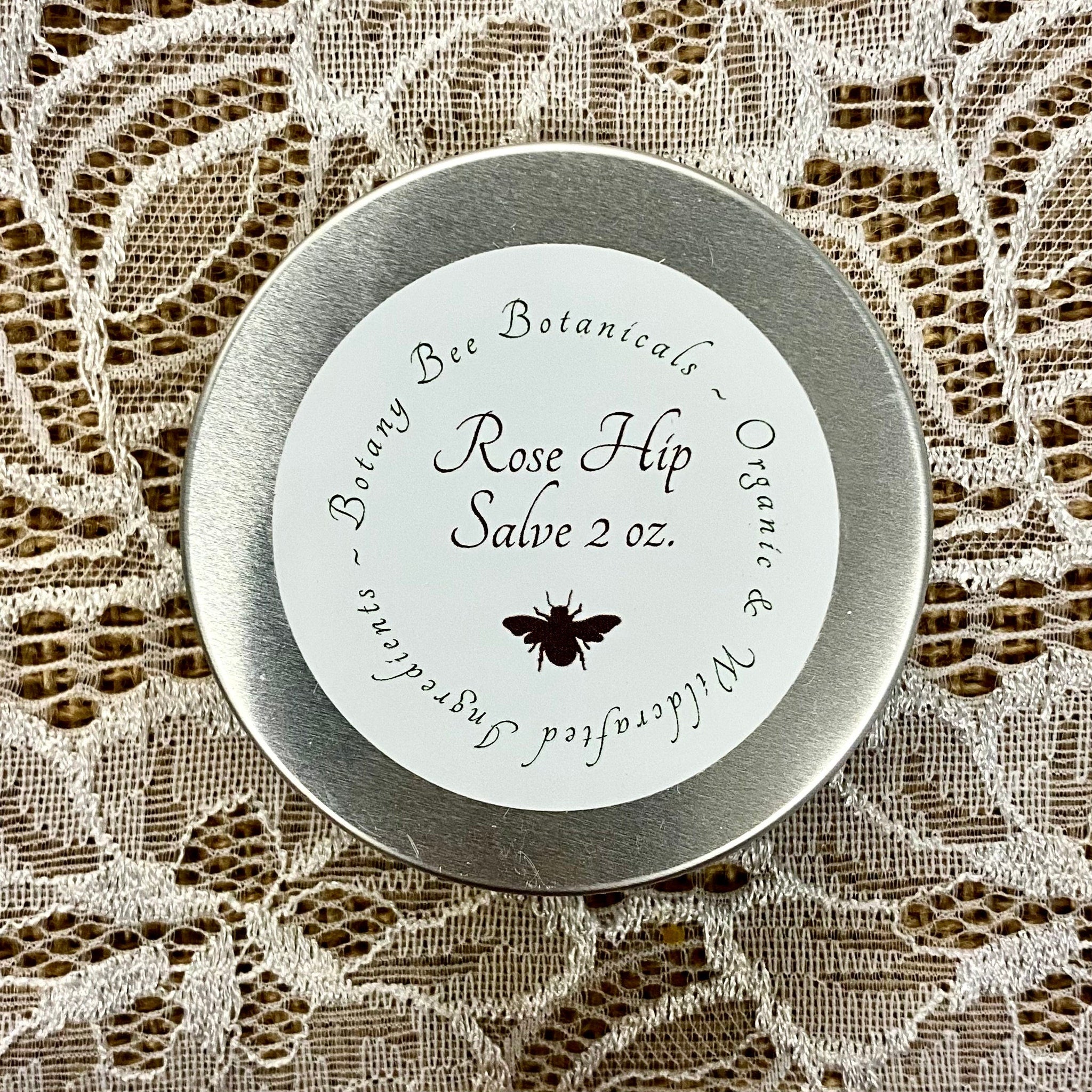 Rose Hip Salve in silver tin with white label, Botany Bee Botanicals brand
