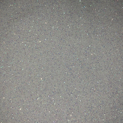 Close-up of sparkling bronze eyeshadow palette with shimmer particles and smooth pressed powder texture