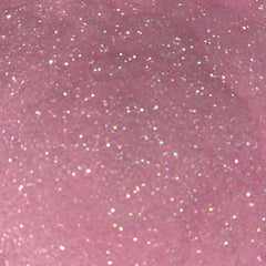 Close-up of Pink Lemonade Eye Shadow showing vibrant coral-pink shimmer with smooth, blendable powder texture