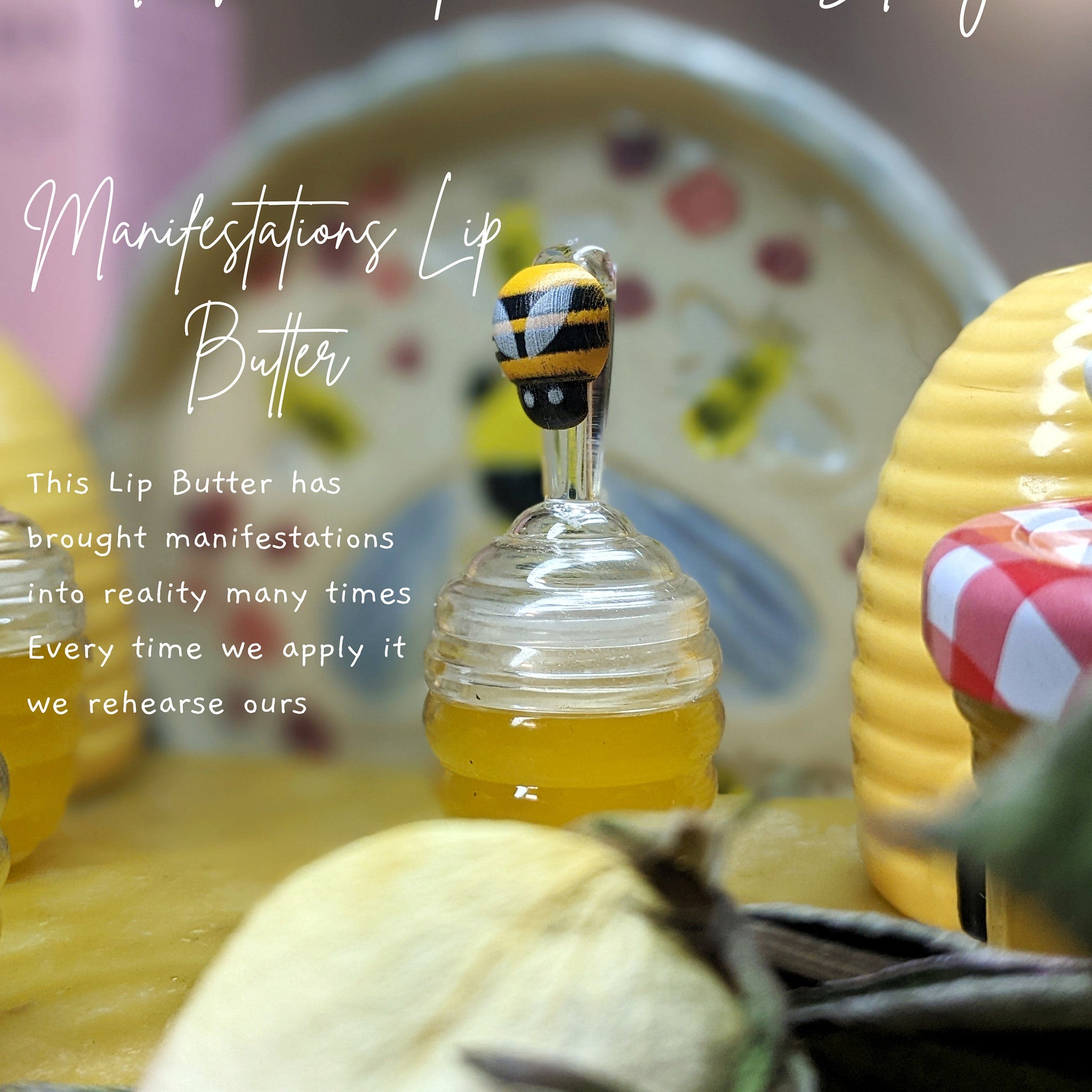 Lip Butter with yellow liquid, glass jar, and bee-shaped topper with black stripes and yellow accents