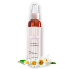 Chamomile floral water spray bottle, clear glass, pink label, with Garna text and daisy flowers