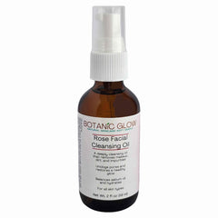 Facial cleansing oil bottle, brown glass, white pump, Botanic Glow brand name visible