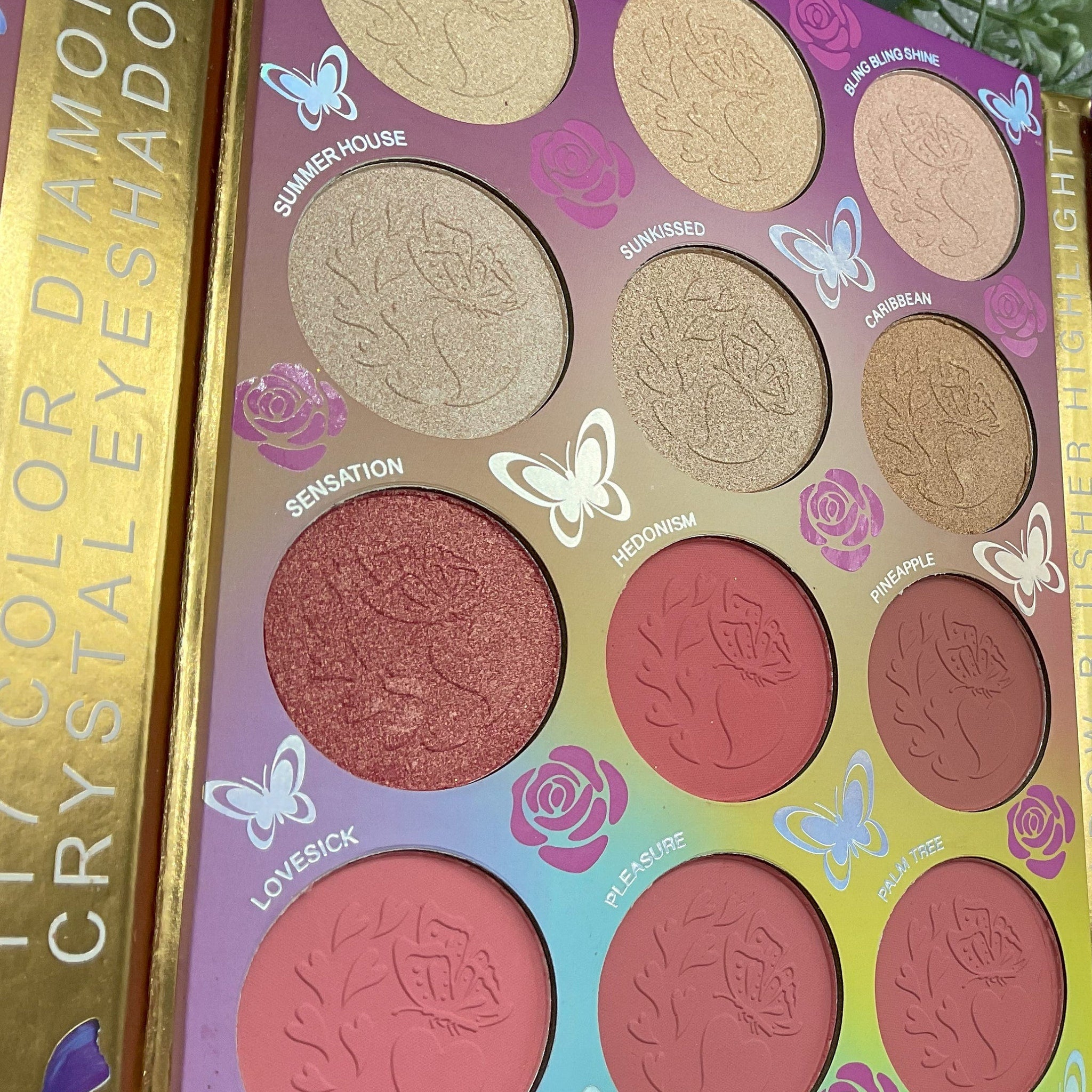 Eyeshadow palette with gold, pink, and peach tones, butterfly and rose details, and "COLOR DIAMOND" text