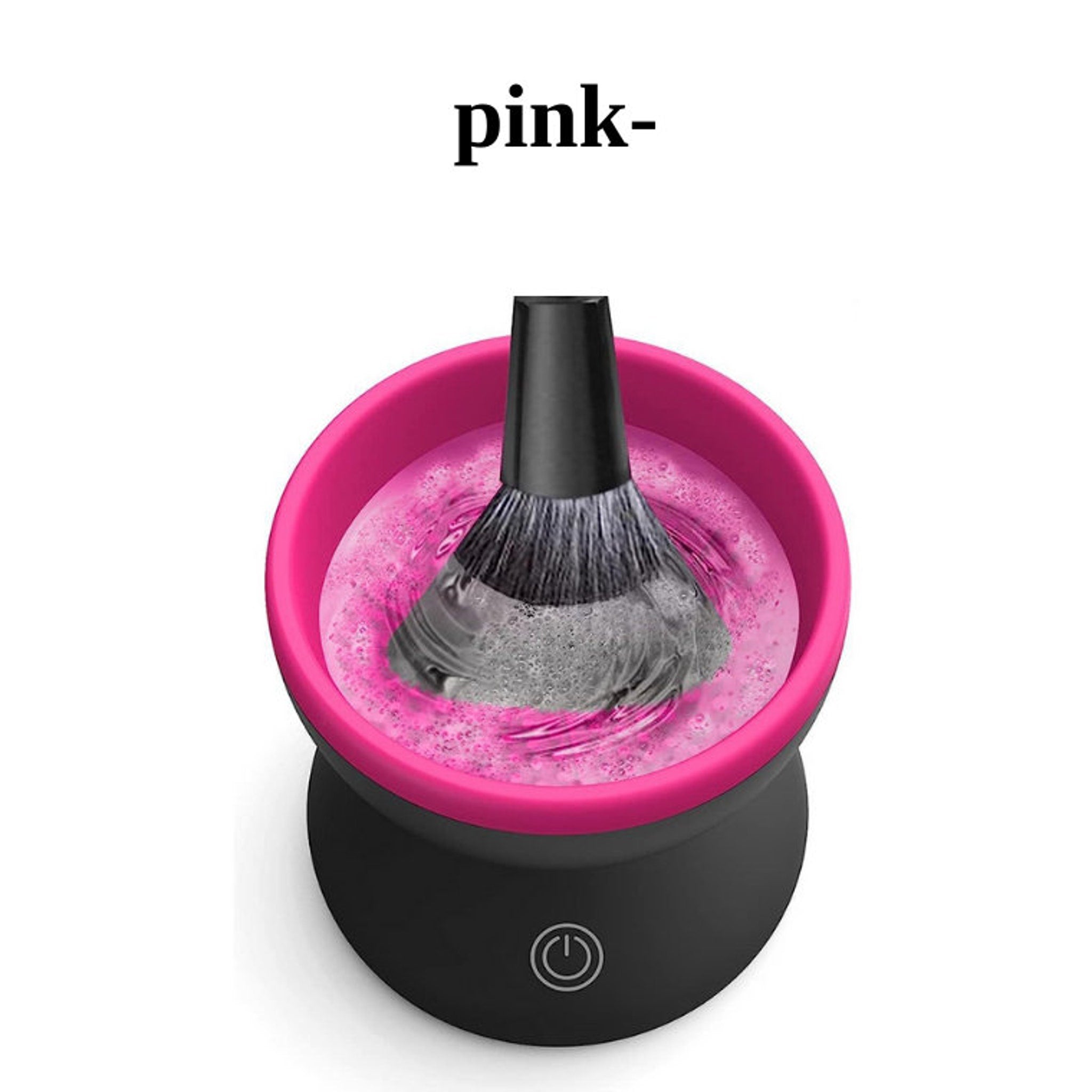 Makeup brush cleaner with pink and black bowl, and a brush being cleaned inside