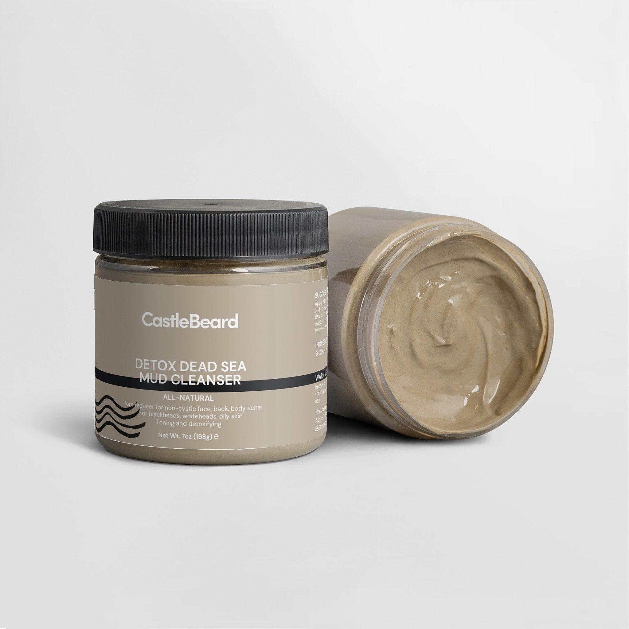 Mud cleanser jar with black lid, tan label, and mud inside, by CastleBeard