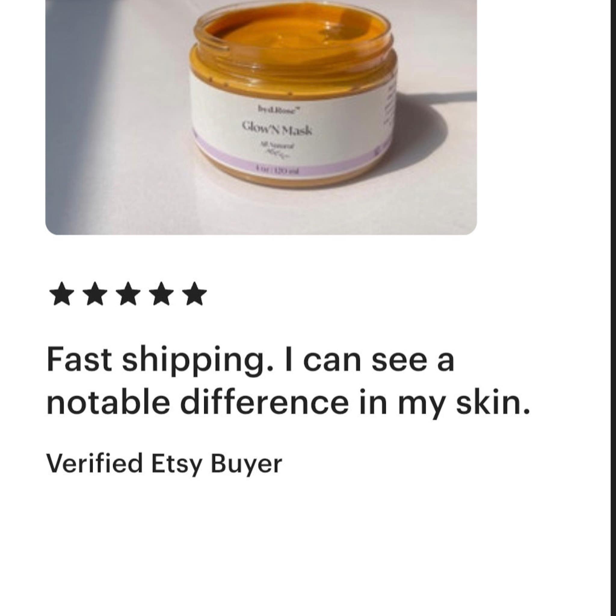 Face mask jar with orange contents, white label, and "Glow'N Mask" text visible