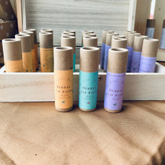 Herbal lip balm tubes, brown cardboard and colorful labels, My Little Naturals brand