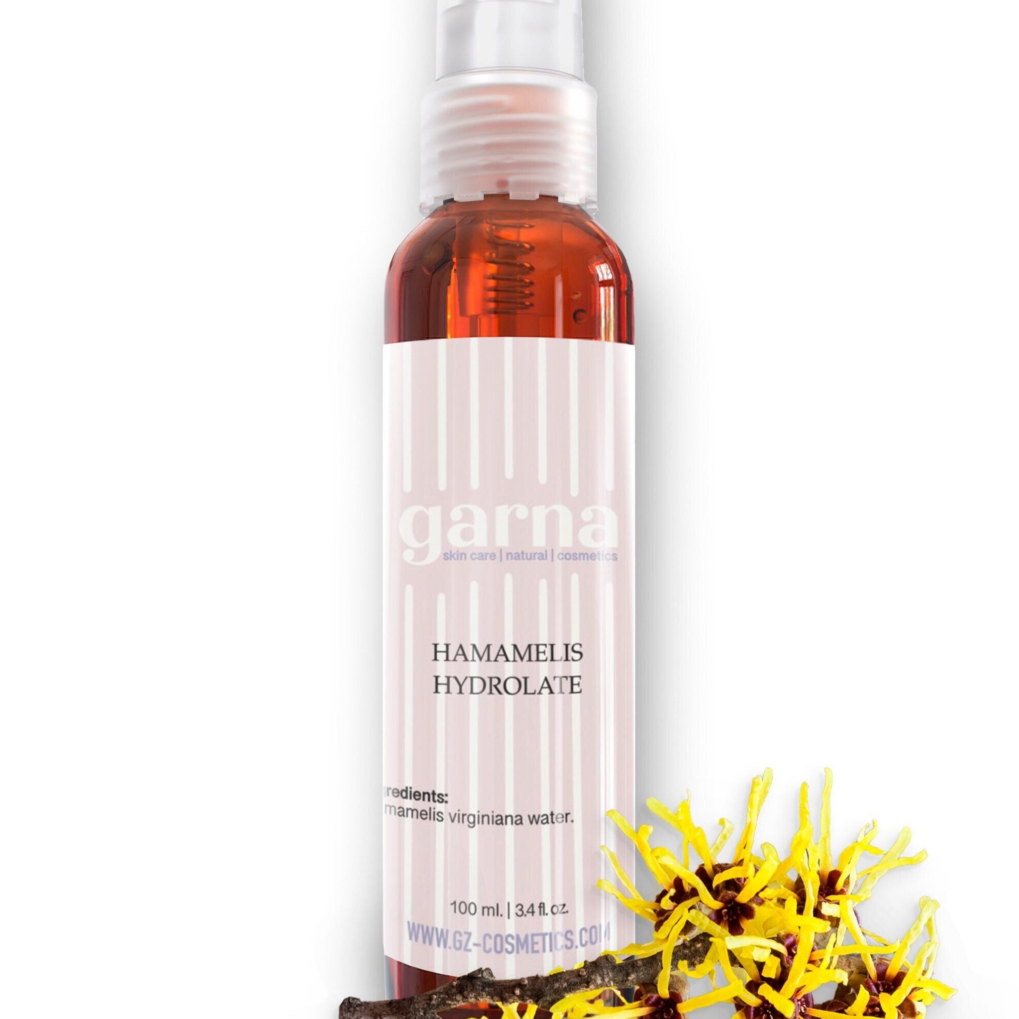 Toner bottle with Garna label, clear liquid, and yellow flowers on white background