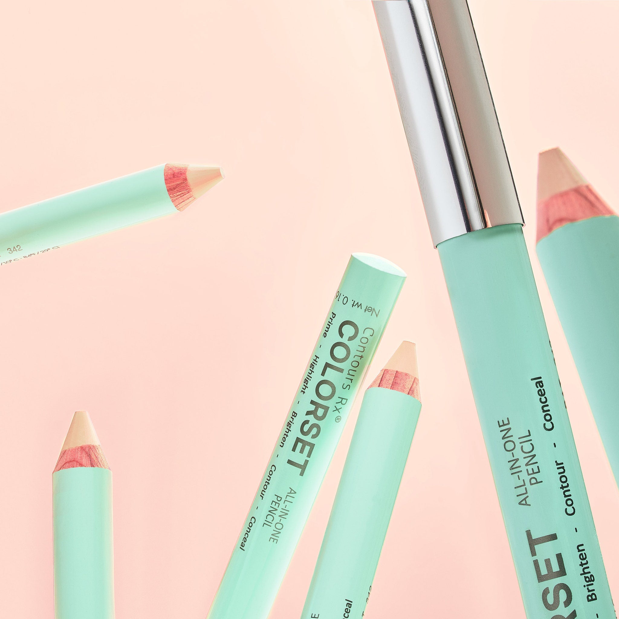 All-in-one pencil with mint green barrel, silver cap, and peach tip, brand name visible