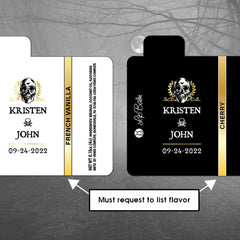Lip balm packaging with black and white labels, gold accents, and skull logo, Kristen John brand