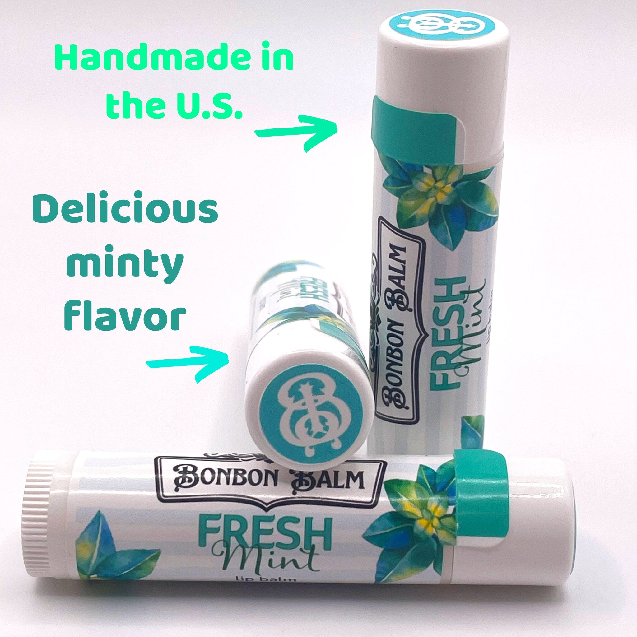 Lip balm tubes with white and teal design, Bonbon Balm brand, Fresh Mint flavor