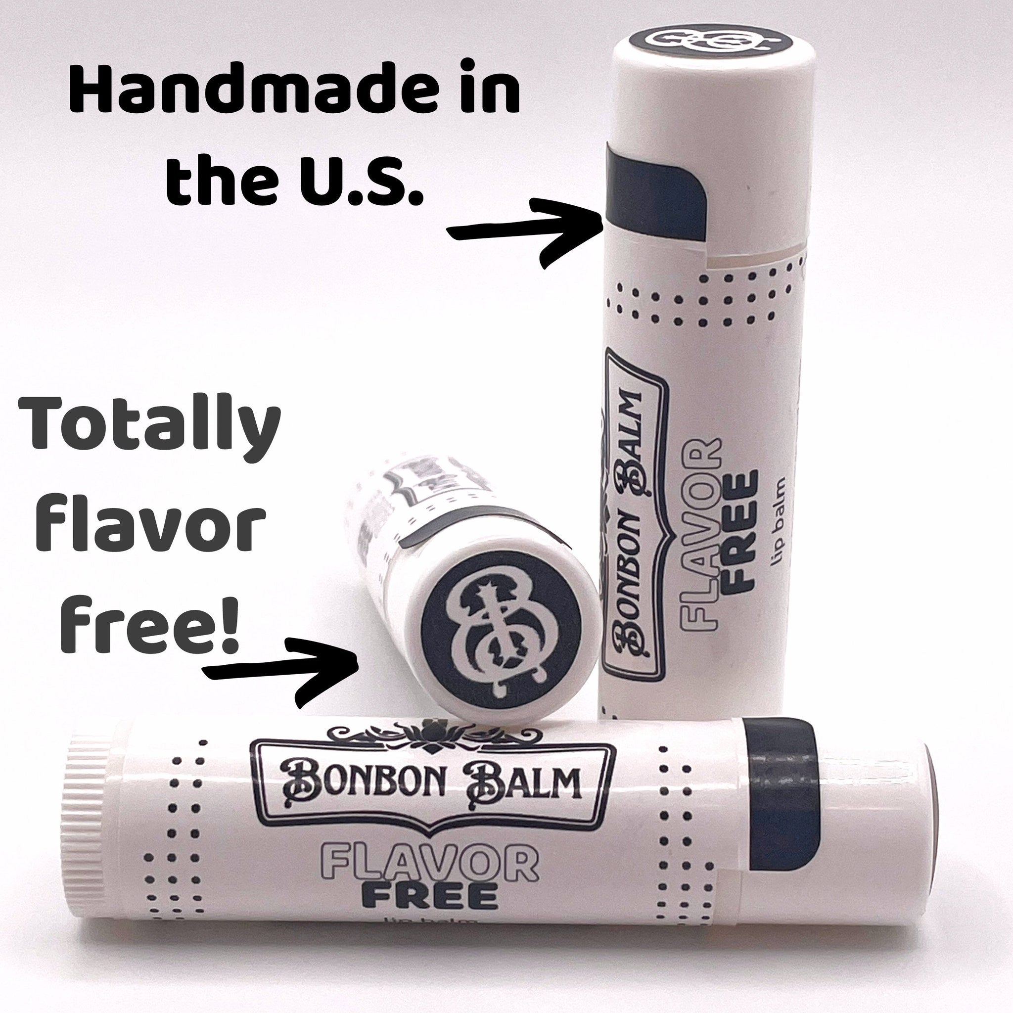Lip balm tubes in white with black accents and Bonbon Balm text, flavor free design