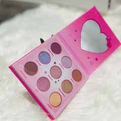 Close-up of Hello Kitty Angel Baby Eyeshadow Palette showing six pastel shades with shimmer finish and cute bow design
