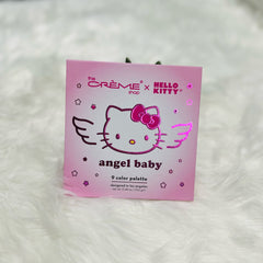 Side view of Hello Kitty Angel Baby Eyeshadow Palette showcasing pastel pink packaging and shimmer shades