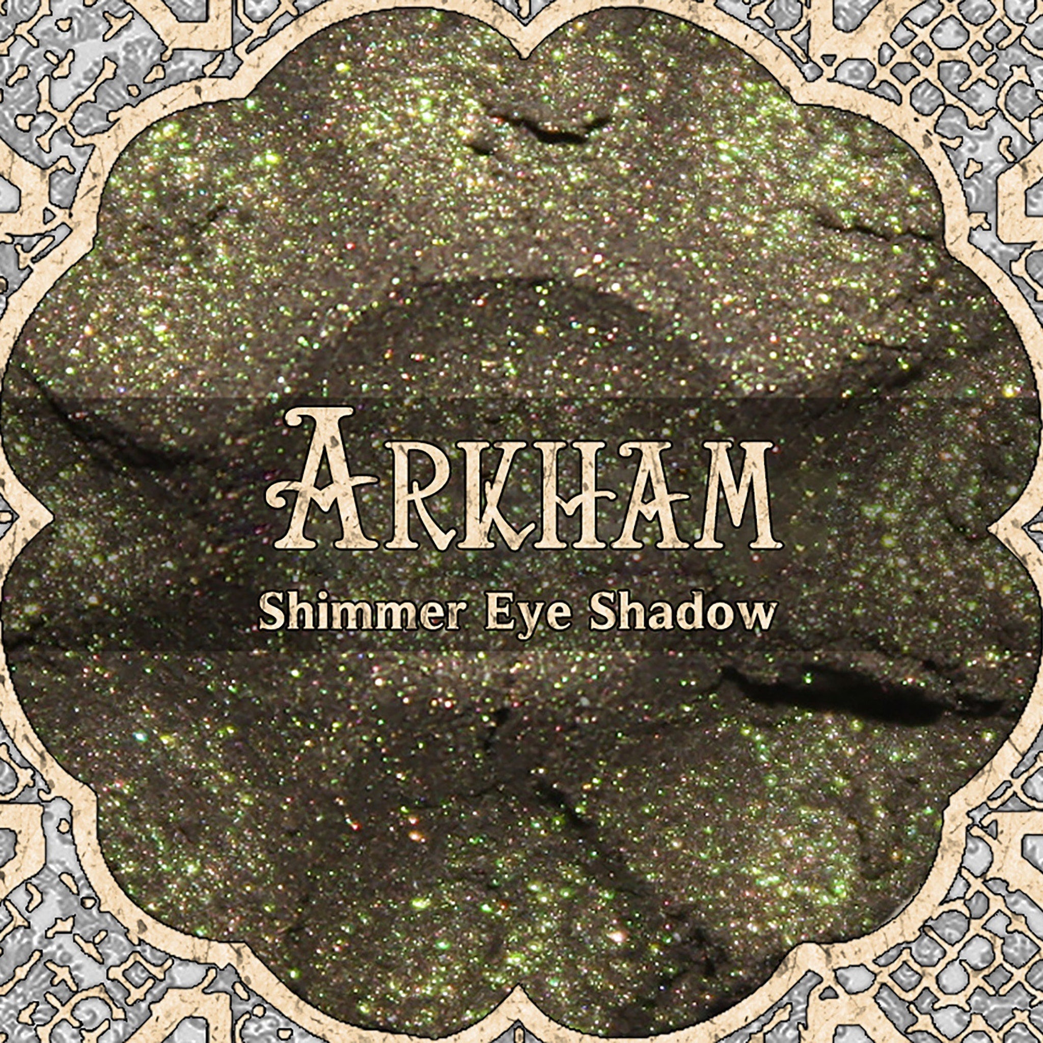 Shimmer eye shadow with amber brown and green sparkle, ARKHAM brand name visible
