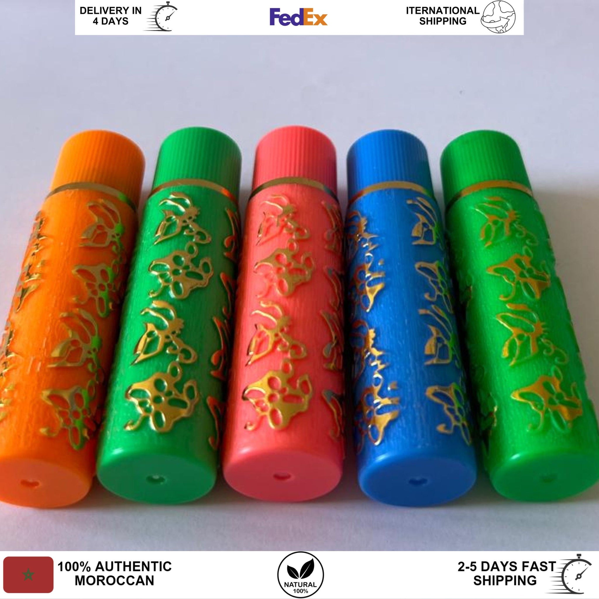 Colorful bottles with gold floral pattern, various colors, cylindrical shape, Moroccan product.