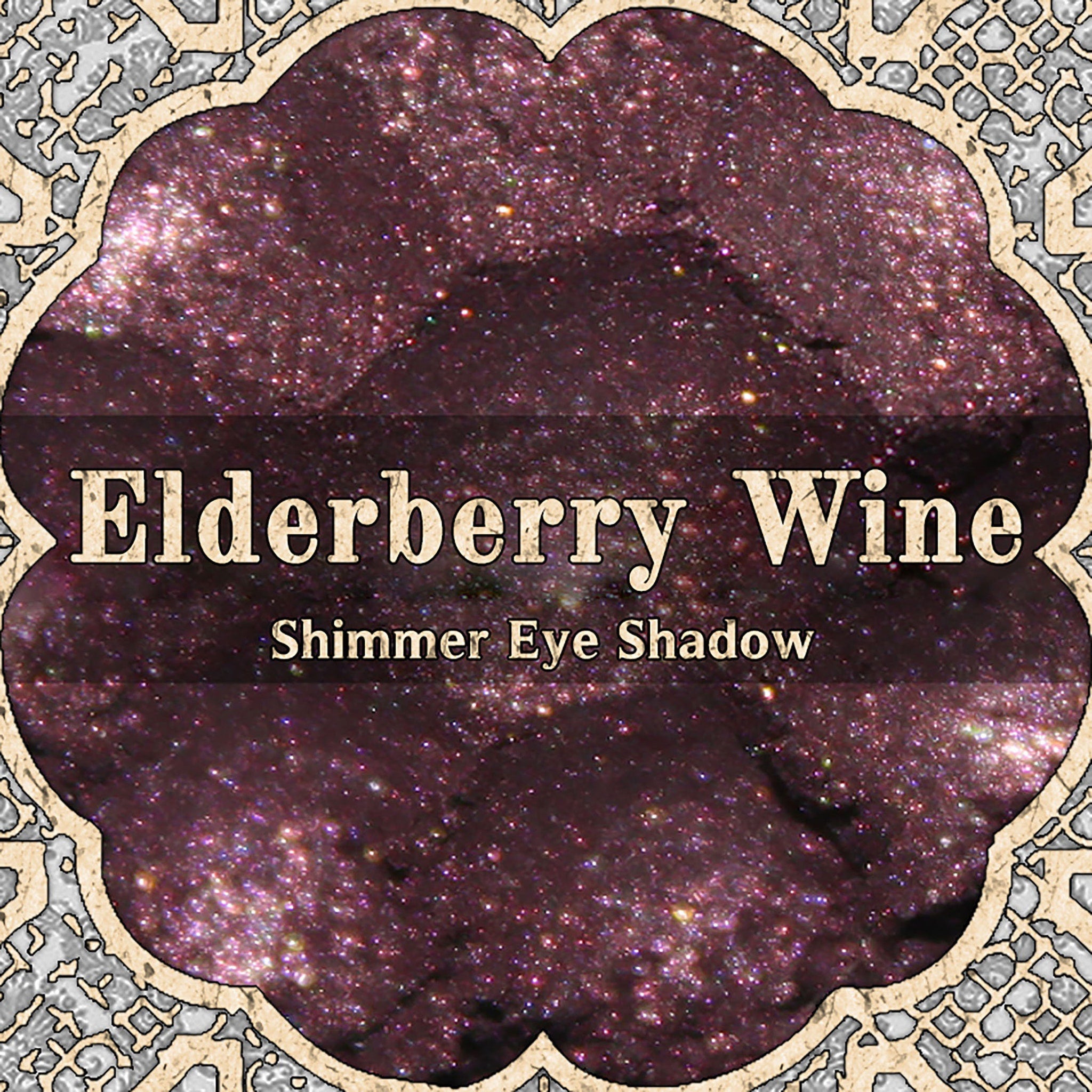 Dark magenta pink and plum vegan loose powder eyeshadow with shimmer in a goth romantic shade called Elderberry Wine.