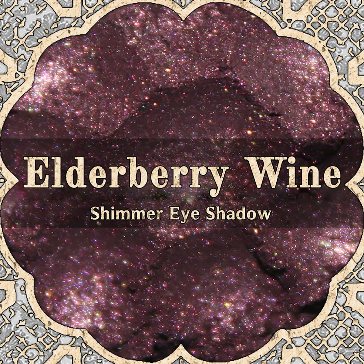 Dark magenta pink and plum vegan loose powder eyeshadow with shimmer in a goth romantic shade called Elderberry Wine.