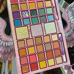 Angel Wings Eyeshadow Palette with 12 shimmer and matte shades in neutral pinks, browns, and golds