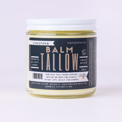 Tallow balm jar with white lid, clear glass, and Lady May's label