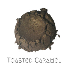 Close-up of Toasted Caramel vegan mineral eyeshadow in shimmering bronze-copper tones with metallic finish