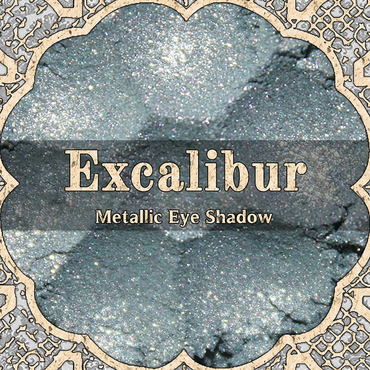 Metallic loose powder eyeshadow in light silver blue shade from the vegan Camelot Collection, sparkling texture shown.