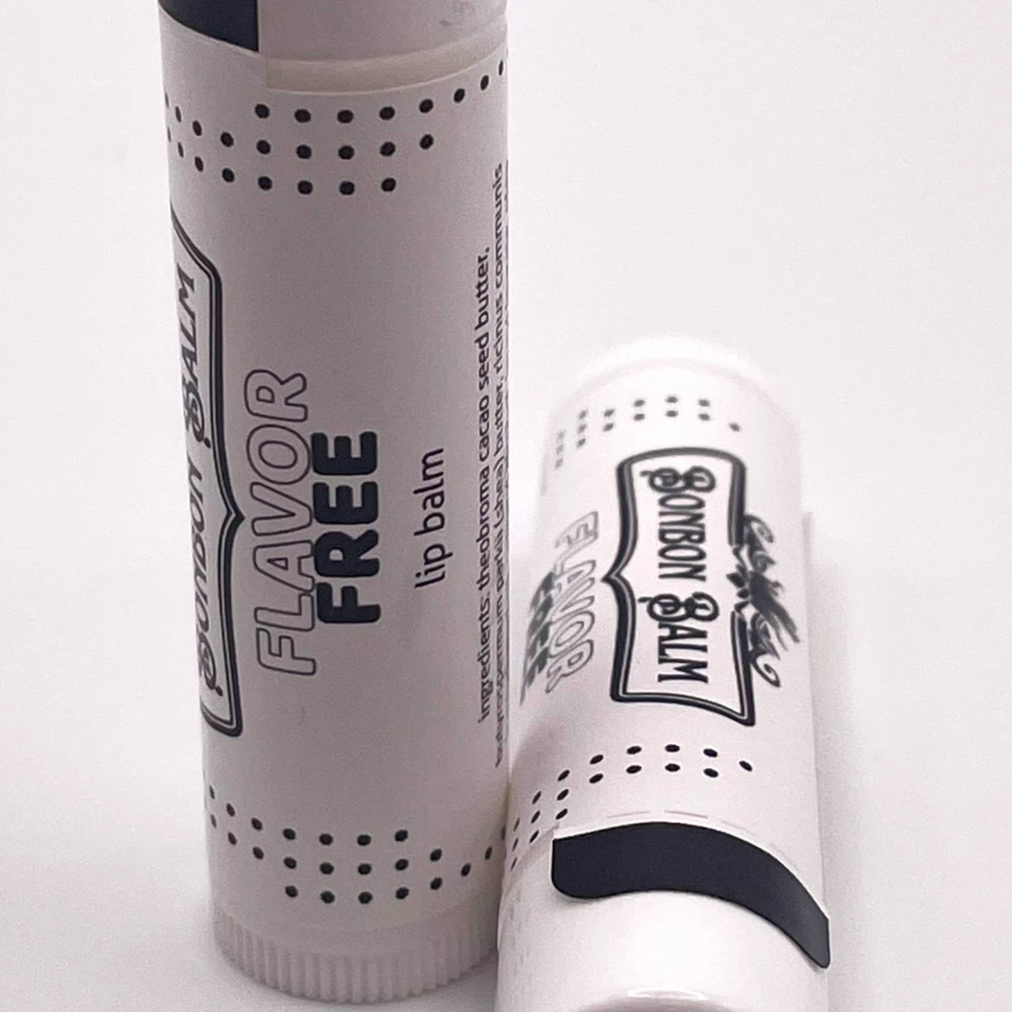 Lip balm tubes with white and black labels, dotted pattern, and "BONBON BALM" text visible