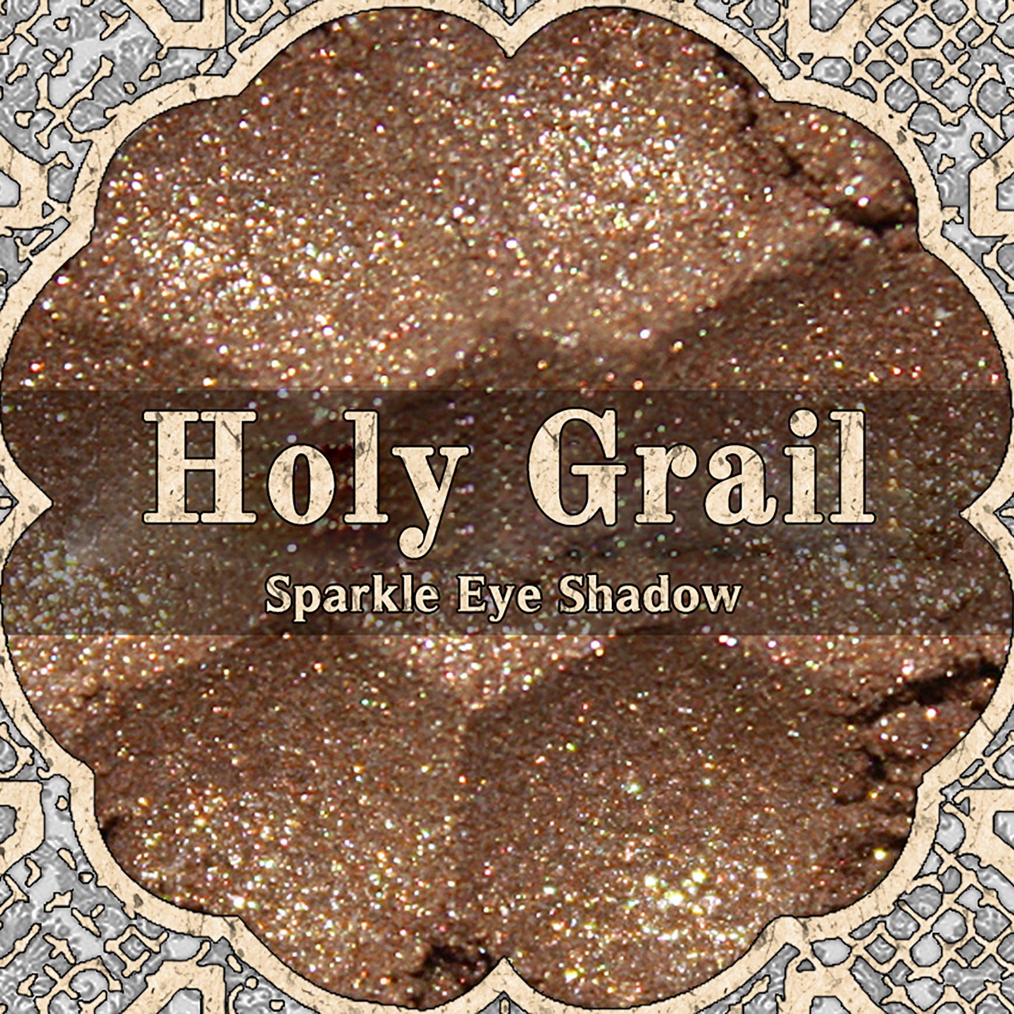 Golden brown loose powder eyeshadow with gold duochrome shimmer and silver glitter flecks in a sifter jar