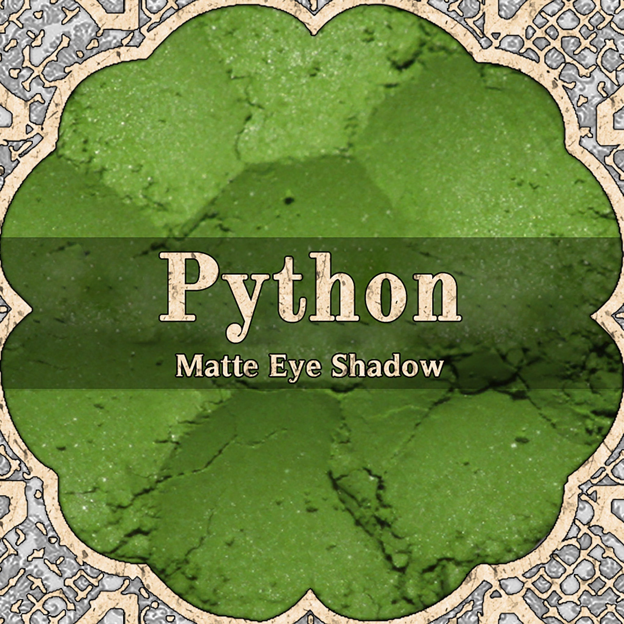 Vibrant matte bright green loose powder eye shadow in a sleek black container with python-inspired texture.