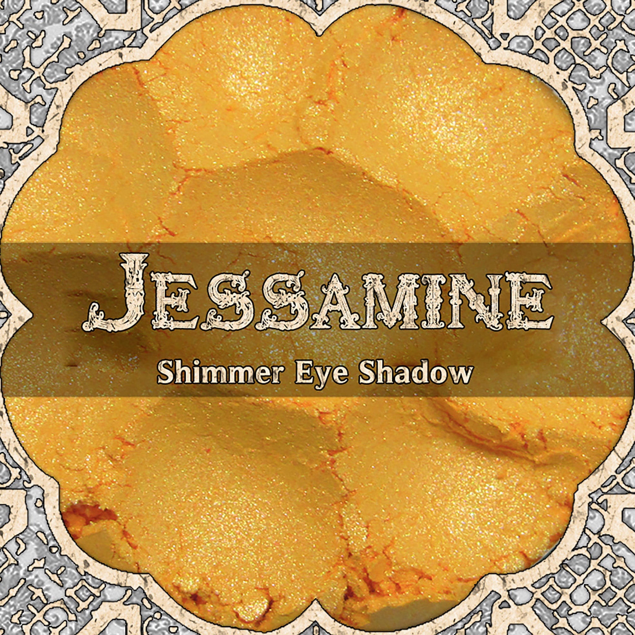 Golden yellow and orange duochrome shimmer eyeshadow in compact with reflective metallic finish