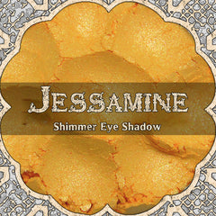 Golden yellow and orange duochrome shimmer eyeshadow in compact with reflective metallic finish
